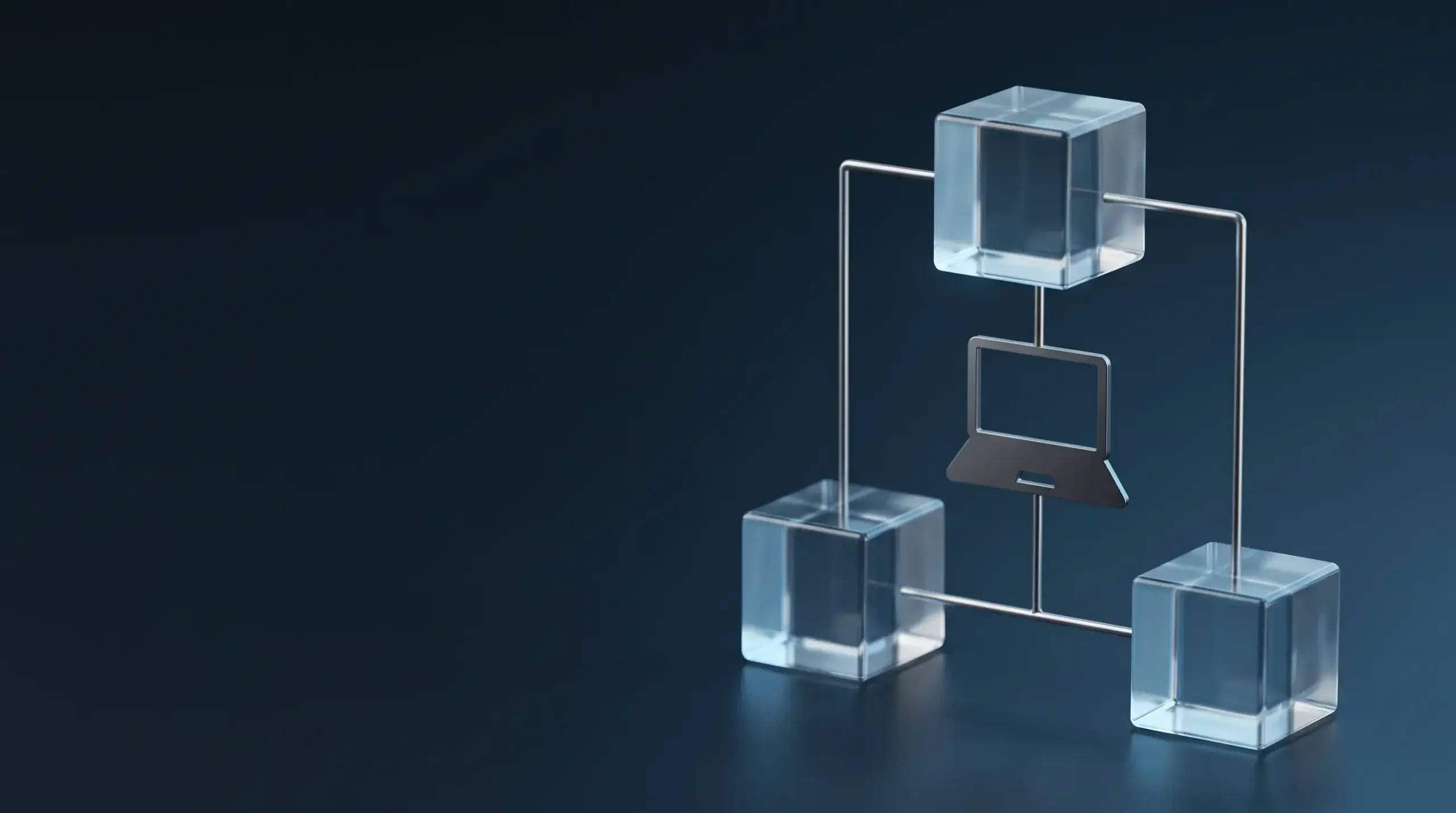 Three glass cubes linked by rods and a laptop